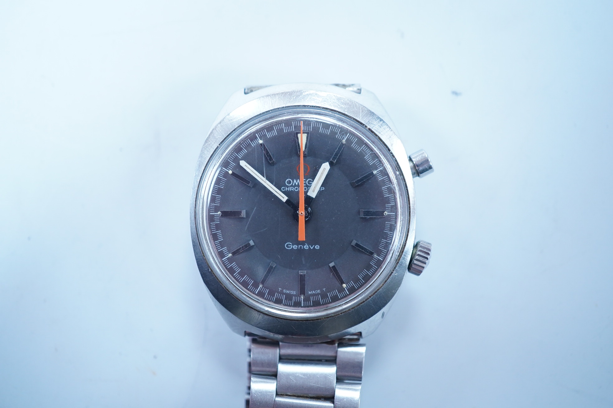 A gentleman's late 1960's? stainless steel Omega Chronostop manual wind wrist watch, with baton numerals, case diameter 33mm, on an associated stainless steel strap. Condition - poor to fair